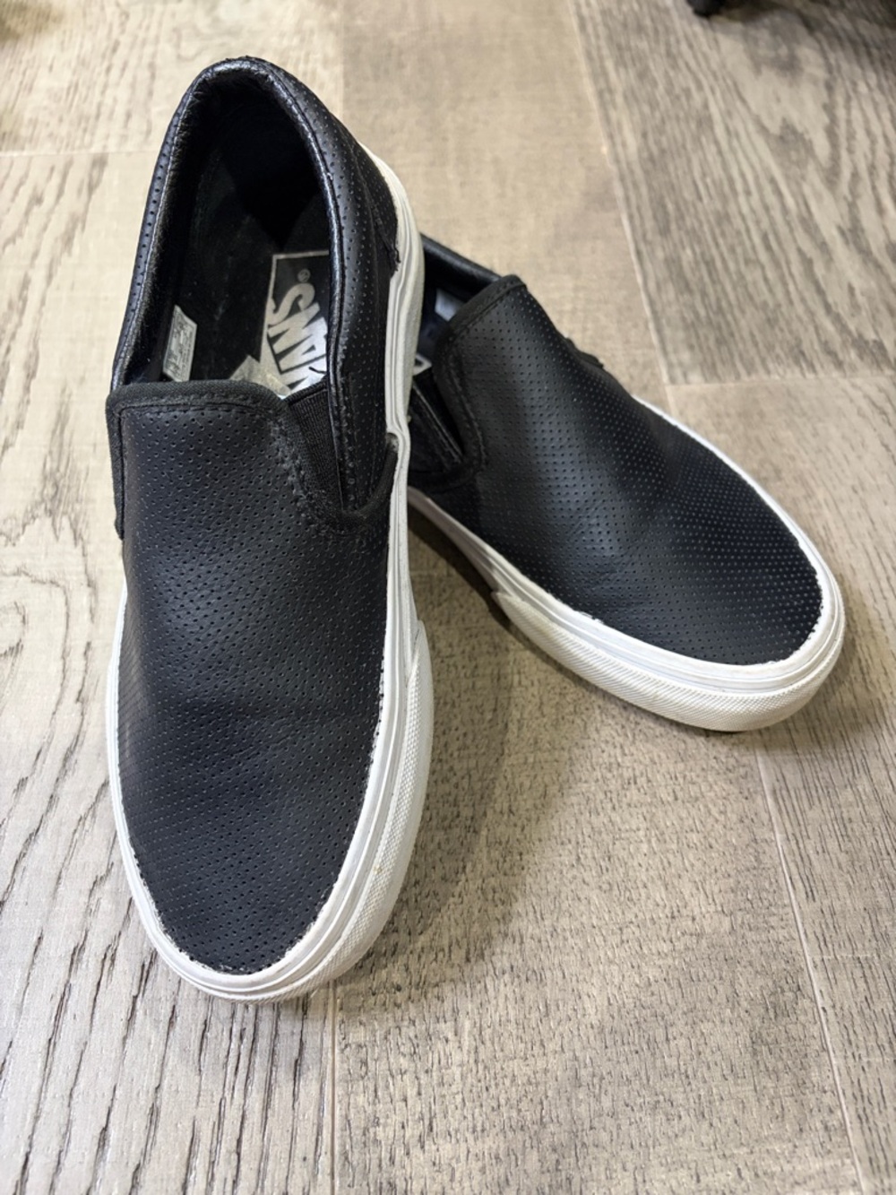 Vans Black Perforated Leather Slip-On Sneakers with White Sole